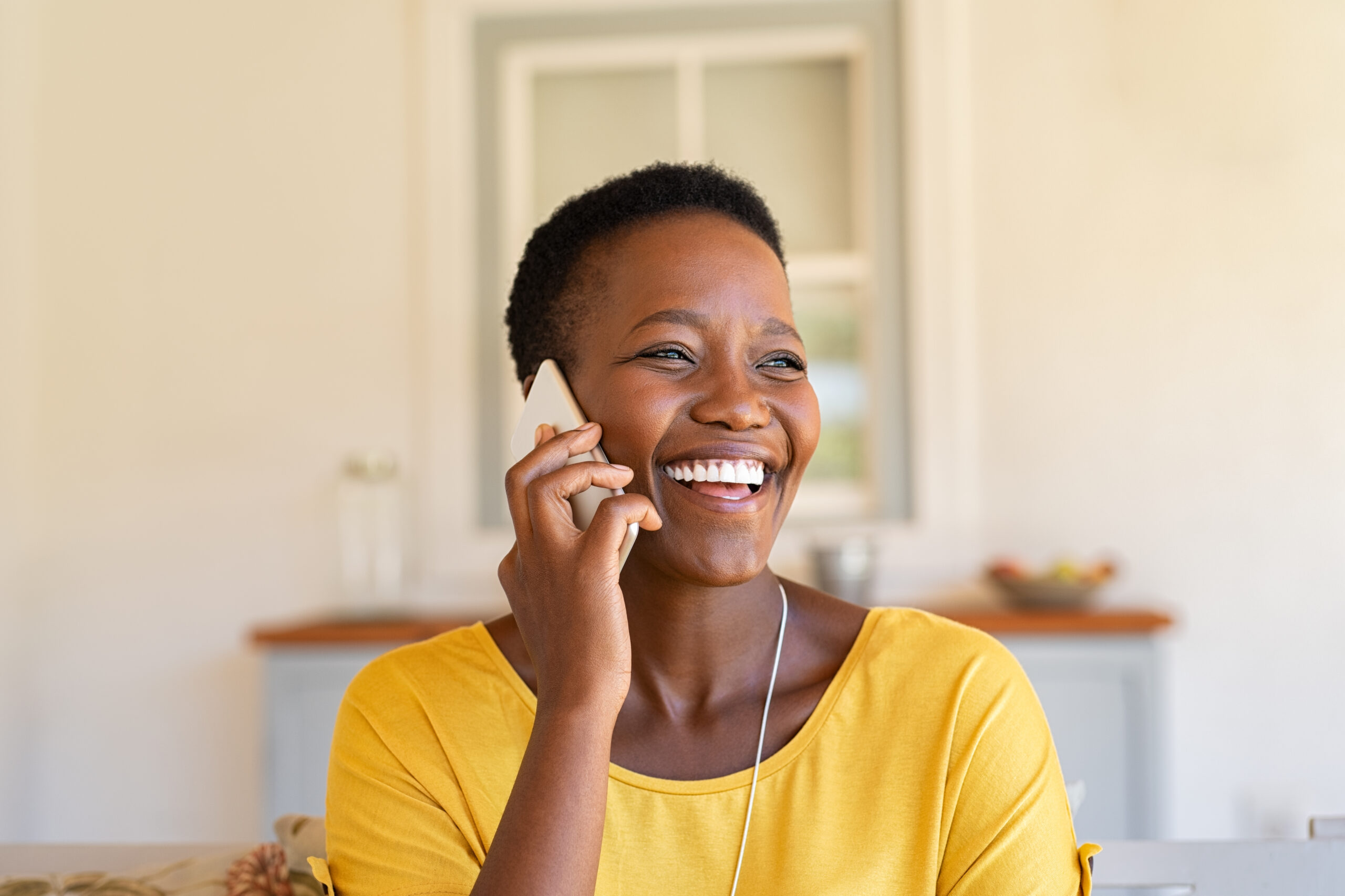 Smiling,African,American,Woman,Talking,On,The,Phone.,Mature,Black